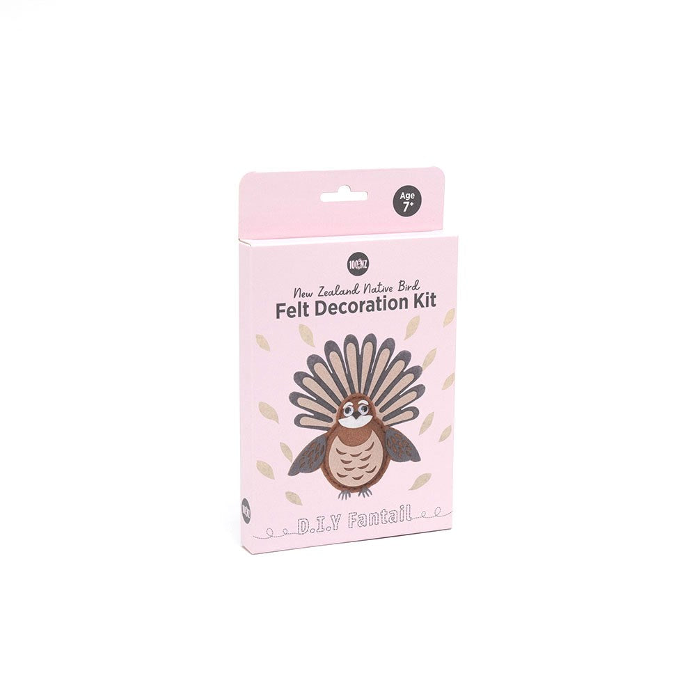 The Fantail Felt DIY Kit comes in a pink box labeled New Zealand Native Bird, with a brown fantail illustration. Recommended for ages 7+, it encourages creativity and provides a fun crafting activity.