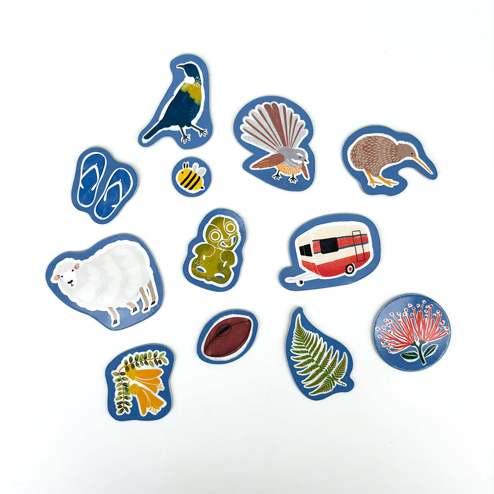 The NZ Icons Magnet Set showcases illustrated magnets of a bird, flip-flops, sheep, and more on a white background—ideal as a gift or New Zealand souvenir.