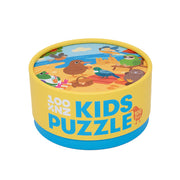 The Beach Party Kids Puzzle comes in a round yellow container labeled 100 pieces and 7+, with a lid illustrated with New Zealand native birds and animals at the beach—ideal for young puzzle enthusiasts.
