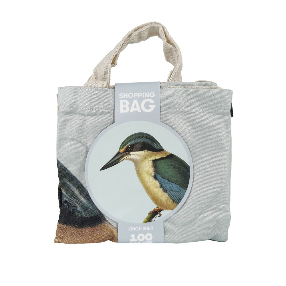 The Hushed Kingfisher Shopping Bag is a lightweight, reusable bag with handles and a kingfisher illustration on the front, plus a tag that reads Shopping Bag Kingfisher 100%. Ideal for everyday use.
