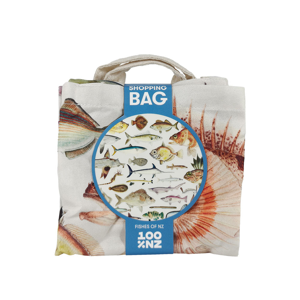 The Fishes of New Zealand Shopping Bag is a lightweight, reusable tote with fish illustrations, “Shopping Bag” and “Fishes of NZ” labels, sturdy handles, and comes packaged with a blue band showing different fish species.