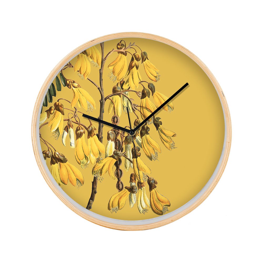 The Vintage Botanical Kowhai Wooden Frame Clock features a yellow background and a flowering kowhai branch illustration, with black hour and minute hands at 10:09 and no numerals on the round wooden clock face.