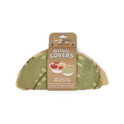 The Raw Bowl Covers (set of 2) feature a green leaf pattern, cotton outer, and food-safe lining. Reusable and machine washable, these eco-friendly covers are perfect for keeping your bowls covered sustainably.