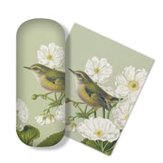 The Birds & Botanicals Rifleman Glasses Case comes with a matching microfibre cloth and features a small bird among white flowers on a light green background—ideal for cleaning glasses or screens.