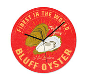 The NZ Seafood Oysters Frameless Clock is a round red wall clock with opened and closed oysters, yellow and white Finest in the World Bluff Oyster and Fresh & Juicy New Zealand text, plus silent movement for quiet operation.