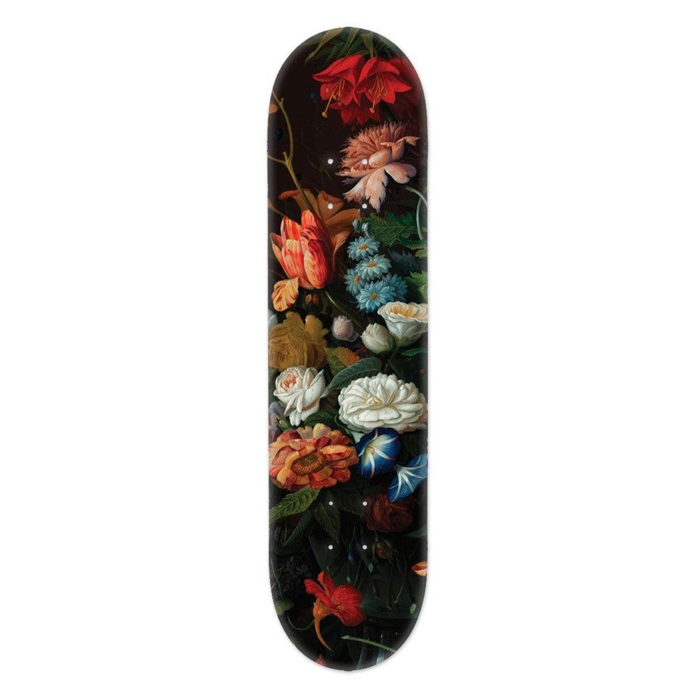 The Vintage Flowers Skateboard Deck - Second showcases a Canadian maple deck with a dark background and detailed, colorful vintage-inspired floral artwork, including roses and lilies.