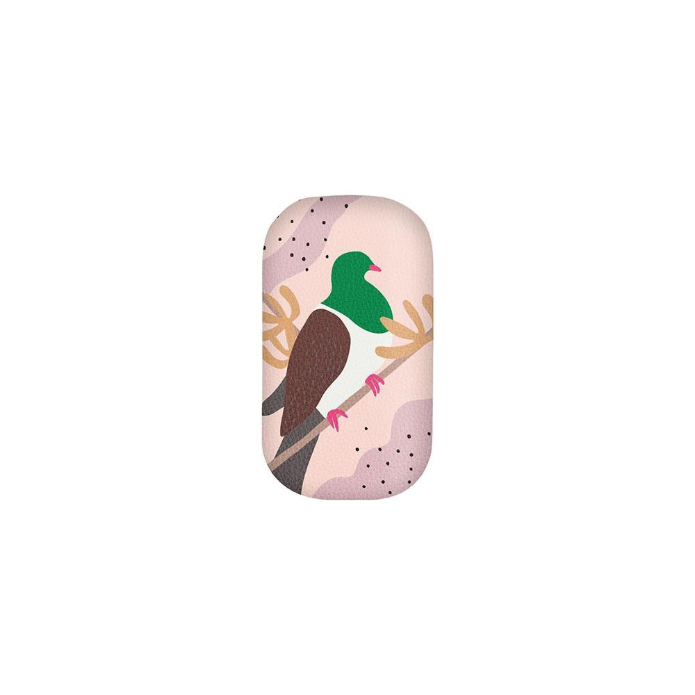 An illustration of a green-headed, brown-bodied Kereru with red feet perched on a branch decorates this Cut-out Kereru Trinket Box—ideal for storage and a unique gift for all.