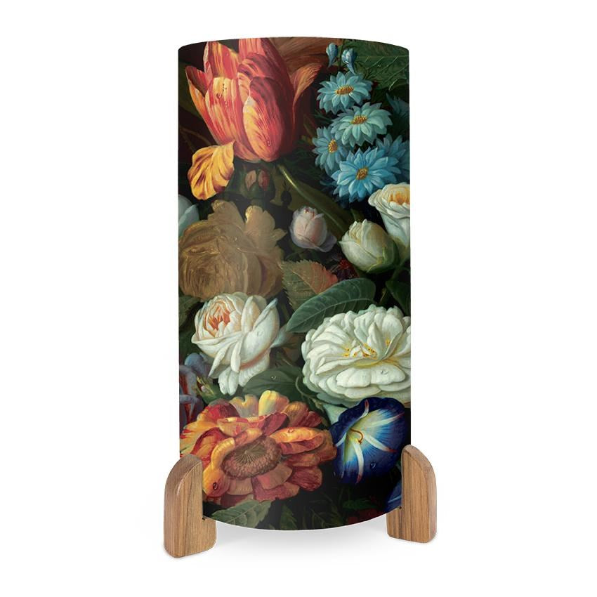 The Vintage Flowers Table Lamp features vibrant images of detailed roses, tulips, and daisies on a dark background with a wooden base—perfect for adding New Zealand-inspired charm to any room.