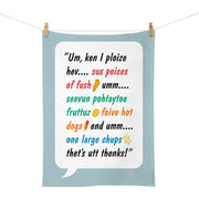 The Glenn Jones - Fush & Chups Tea Towel, designed in New Zealand, features a colorful speech bubble with a humorous, phonetically written food order, imitating a childs pronunciation.
