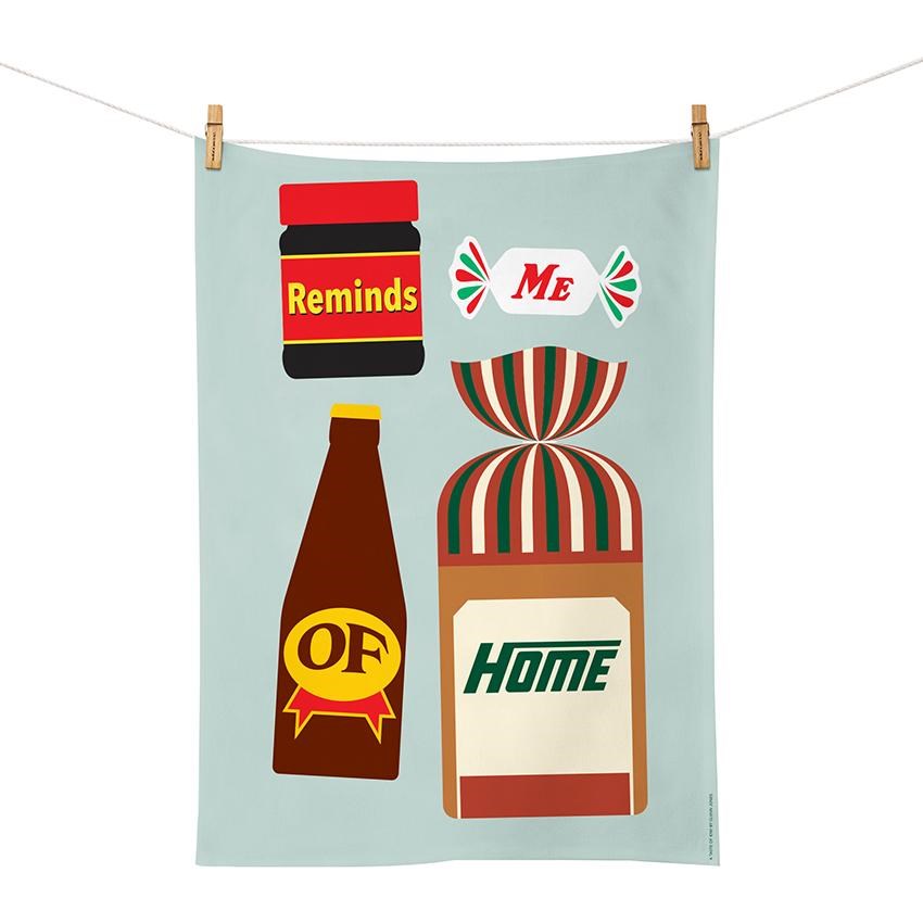 The Glenn Jones - Taste of Kiwi Tea Towel, designed in New Zealand, features playful illustrations and text— a jam jar labeled “Reminds,” candy “Me,” bottle “Of,” and bread “Home”—by NZ artist Glenn Jones.