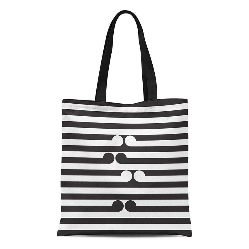 The Gordon Walters - Untitled-No.1 Tote Bag is a black and white cotton bag with curved shapes screen printed vertically in the center, inspired by Walters’ minimalist artwork. Features horizontal stripes and black handles.