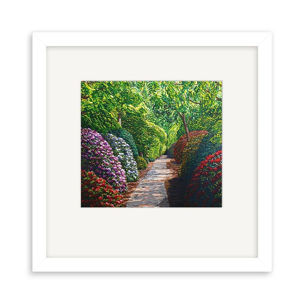 The Karl Maughan Riverhead Small Art Print: Second Frame features a garden scene with a stone path, green trees, and colorful bushes in Karl Maughan’s signature style. Limited edition prints are available.