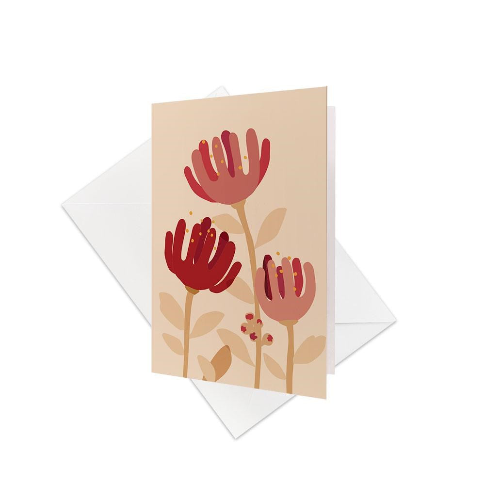 The Raw Pohutukawa Gift Card & Envelope (6 Pack) features stylized red New Zealand Pōhutukawa flowers with yellow accents and beige leaves, each card paired with a white envelope—ideal for adding a special touch to any gift.