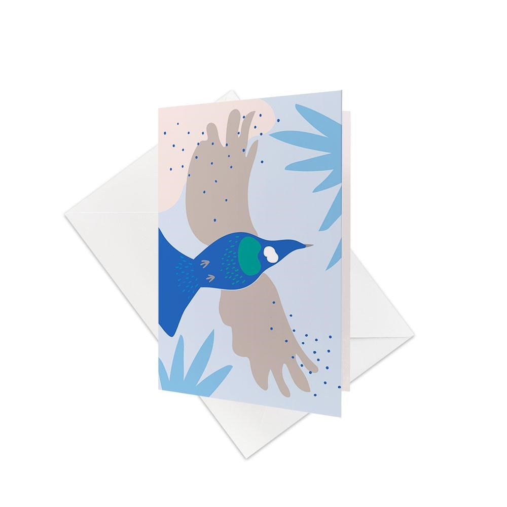 The Cut-out Tui Gift Card & Envelope (6 Pack) features an illustrated Tūī in blue and brown tones amid abstract blue shapes, paired with a plain white envelope—ideal for New Zealand-inspired gift cards or unique greetings.