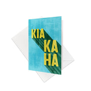 The Te Reo Kia Kaha Gift Card & Envelope (6 Pack) features cards with blue backgrounds and bold yellow KIA KAHA text, accented by a green shadow—a strong tribute to New Zealand Te Reo. Each pack includes matching white envelopes.