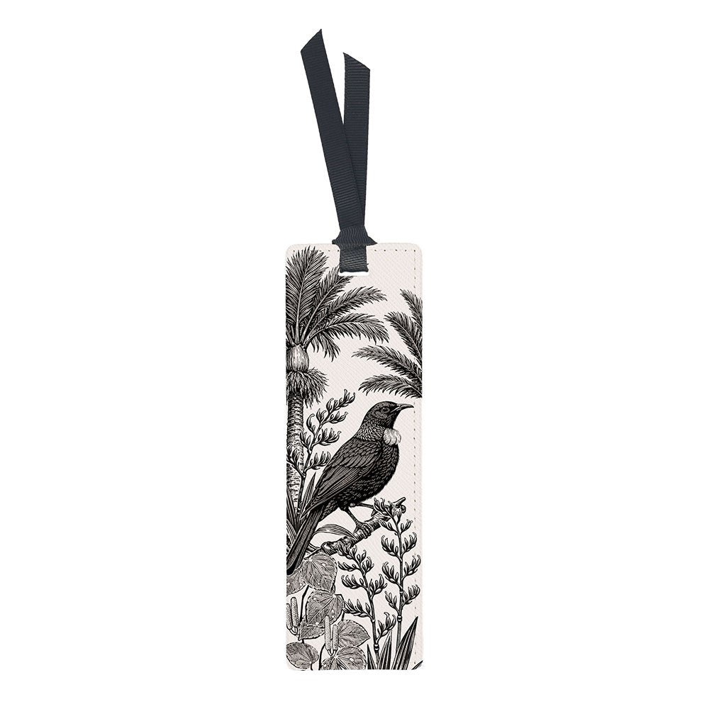 Under the Nikau Bookmark featuring a black and white illustration of a Nīkau bird perched among palm trees and foliage, finished with a black ribbon at the top.