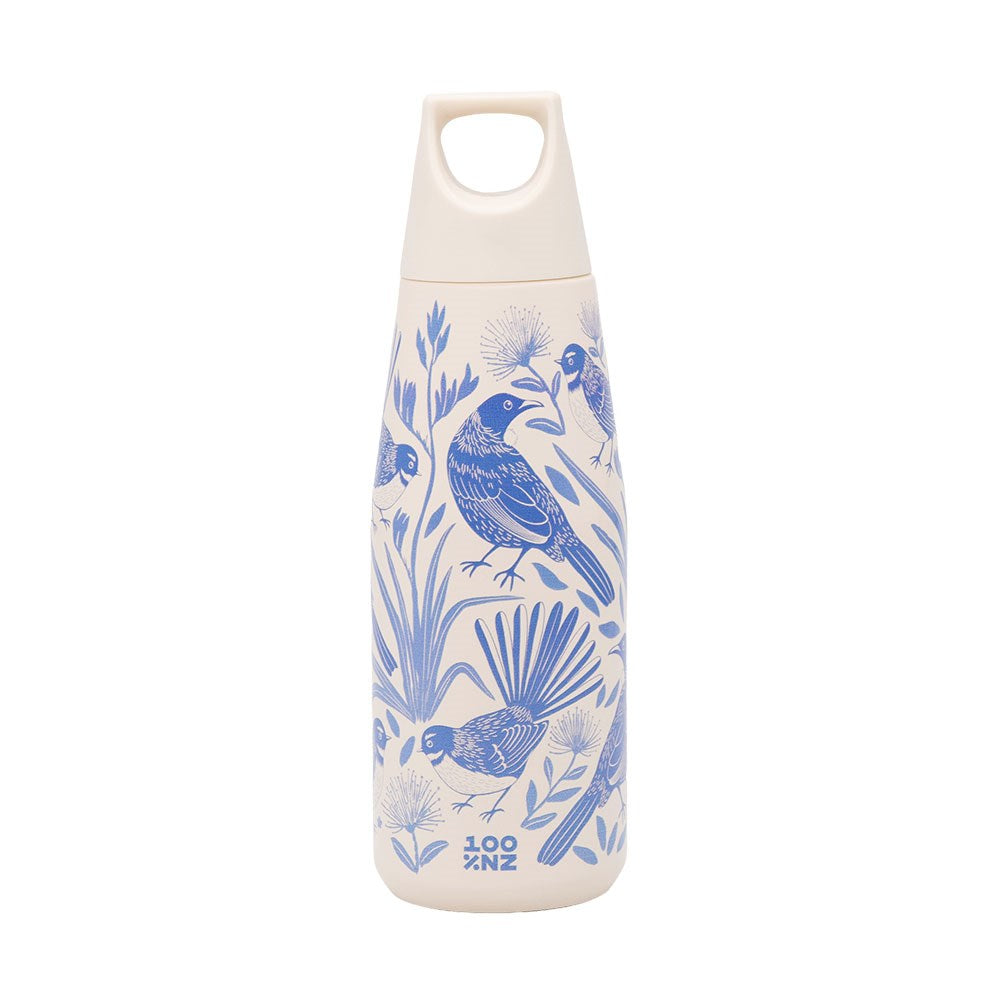 The Birdsong Blues Drink Bottle is a cream-colored, vacuum-insulated stainless steel bottle with blue bird and plant illustrations, a leak-resistant lid with integrated handle, and the 100% NZ logo near the base.