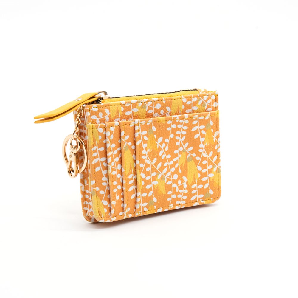 The Kowhai Pattern Coin Purse is a small rectangular vegan leather wallet featuring a yellow and orange floral design, gold zipper, attached keyring, and outer card slots, shown on a white background.