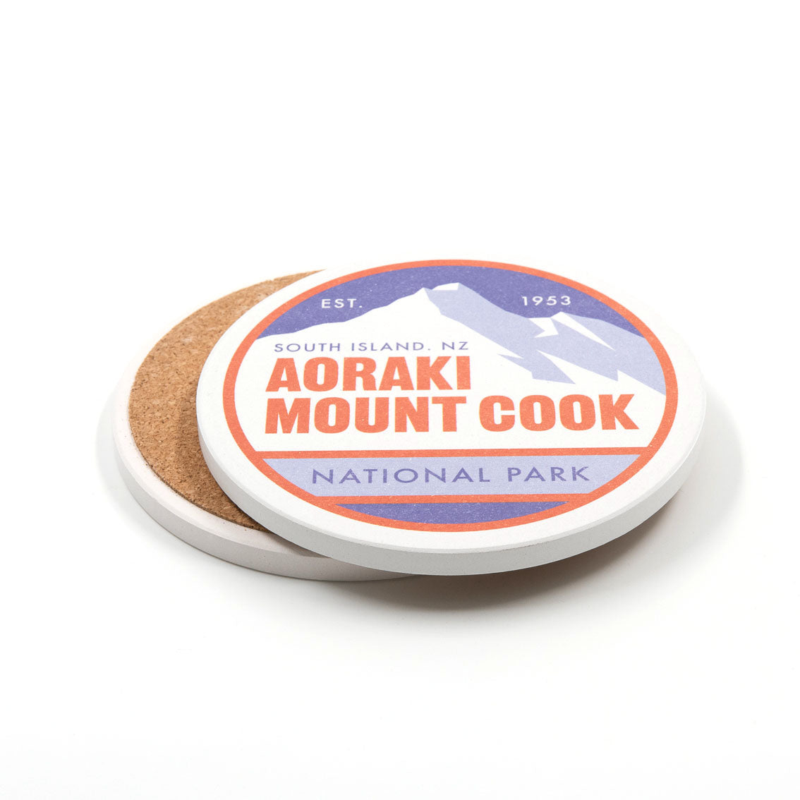 A set of 4 National Park Coasters from Glenn Jones features round cork-backed designs, including a mountain graphic with red "Aoraki Mount Cook National Park, South Island, NZ, Est. 1953" text—part of the New Zealand collection.