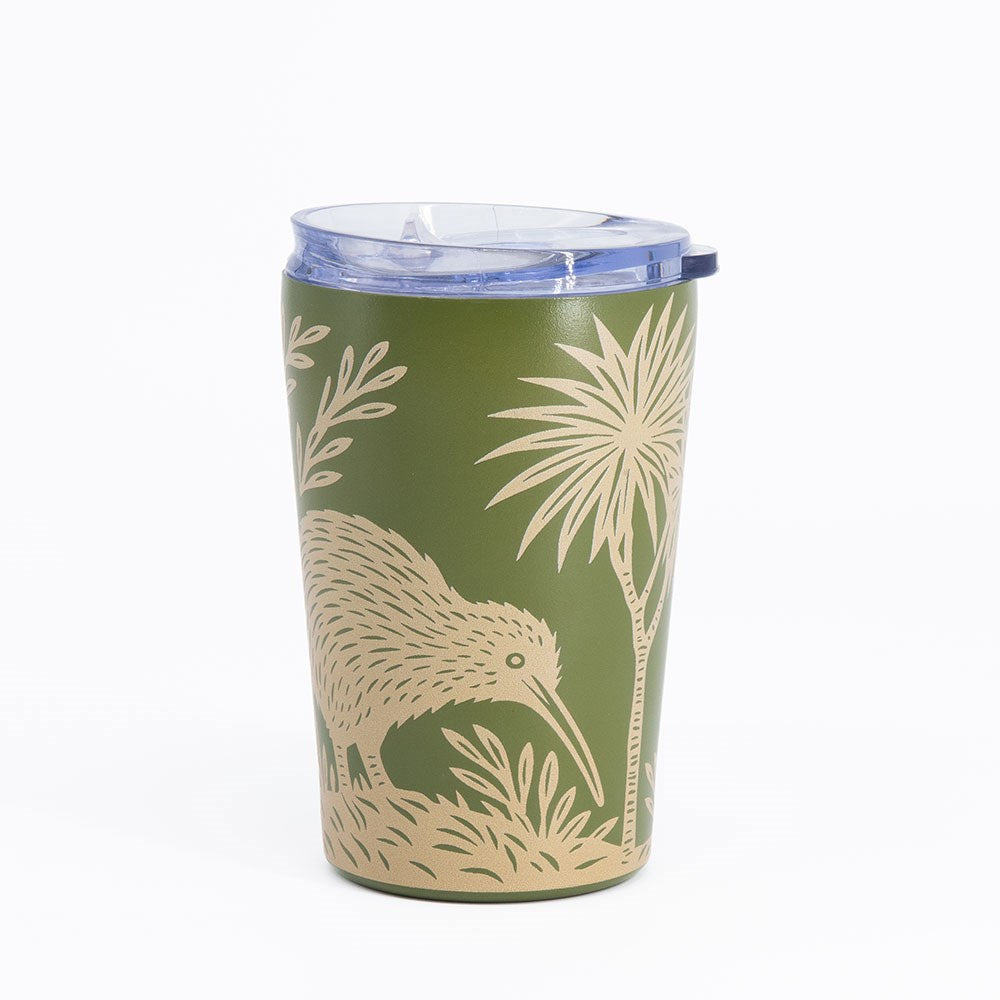 Introducing the Woodcut Kiwi Coffee Cup—a reusable green travel mug crafted from stainless steel with a transparent, spill-resistant lid. Adorned on the side is a beige illustration of a kiwi bird and plants, rendered in an elegant woodcut style. This vacuum-insulated coffee cup is perfect for enjoying your favorite beverages on the go, all set against a plain white background.