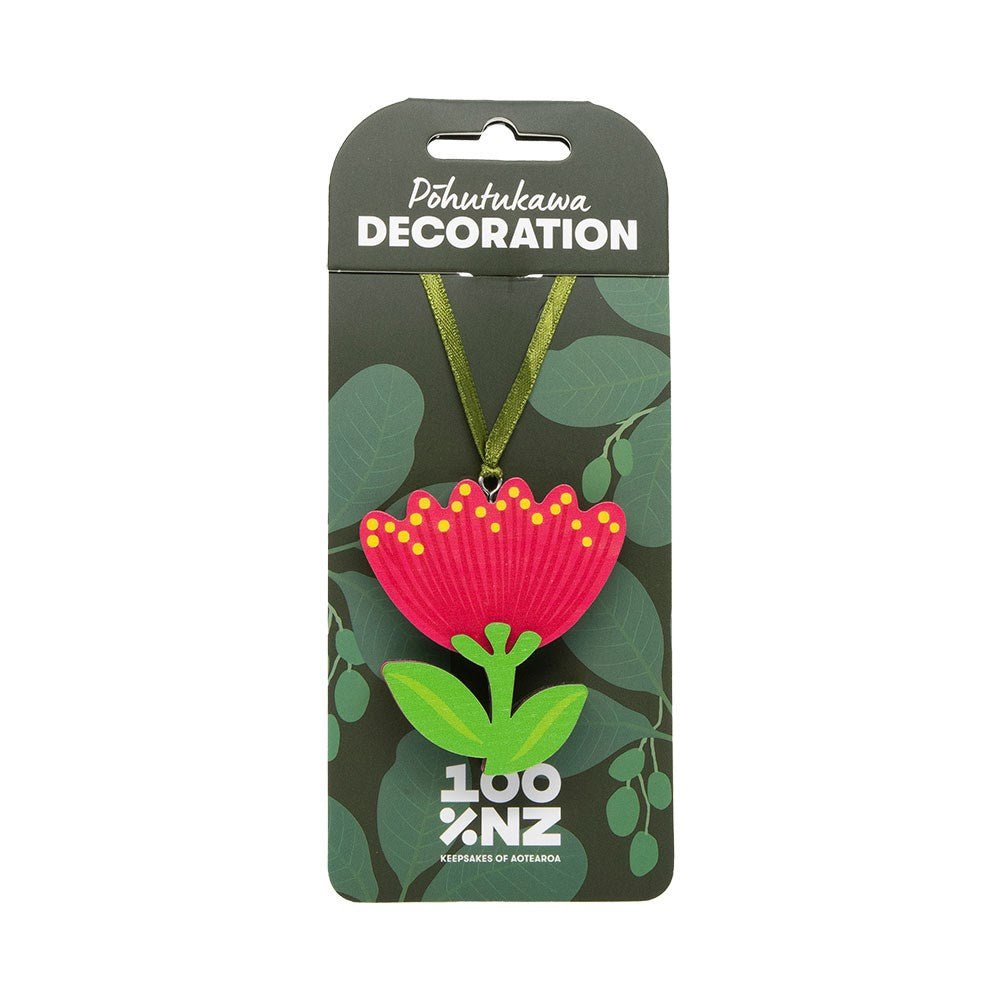 A vibrant Pohutukawa Wooden Decoration with red and yellow flowers, green leaves, and a green ribbon. Packaged and labeled as "Pohutukawa Wooden Decoration, 100% NZ"—perfect for Kiwi Christmas décor.