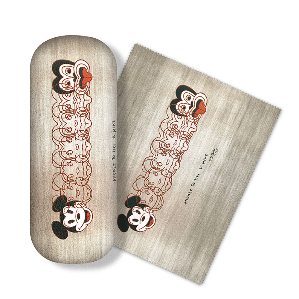 The Dick Frizzell - Mickey To Tiki Glasses Case comes with a high-quality microfibre cloth, both featuring overlapping Mickey Mouse line drawings and MICKEY TO THE POWER on a beige background. Ideal for cleaning glasses and screens.