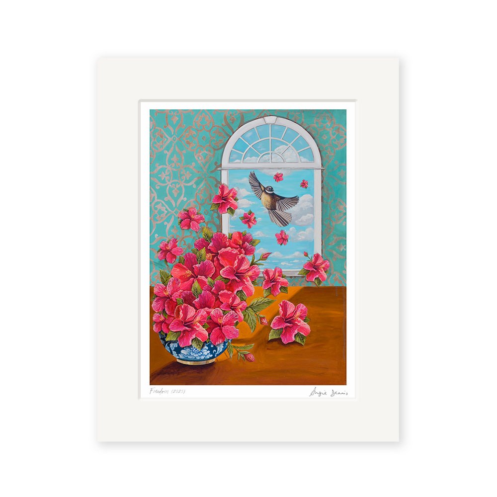 The Angie Dennis - Freedom Art Print features a vase of pink flowers on a brown table, set before a teal patterned wall, with an open window showing a bird and drifting petals—capturing the essence of New Zealand art.