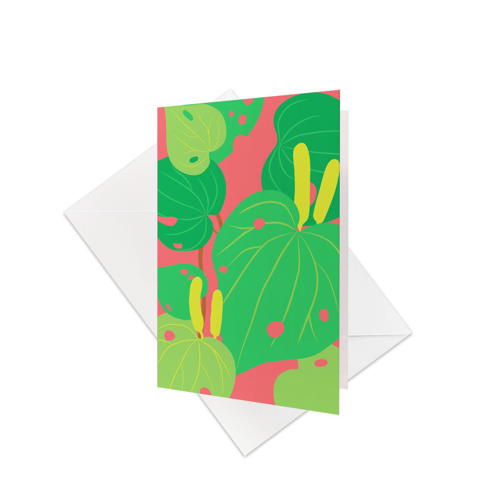 The Bright Botanical Kawakawa Gift Card & Envelope (6 pack) features a vibrant illustration of green Kawakawa leaves and yellow buds on a coral pink background. Designed in New Zealand, its perfect for pairing with gift cards.
