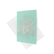 The Te Reo Aroha Gift Card & Envelope (6 Pack) features light blue cards with Aroha in bold, ornate script and decorative swirls, celebrating New Zealand Te Reo. Each card comes with a plain white envelope.