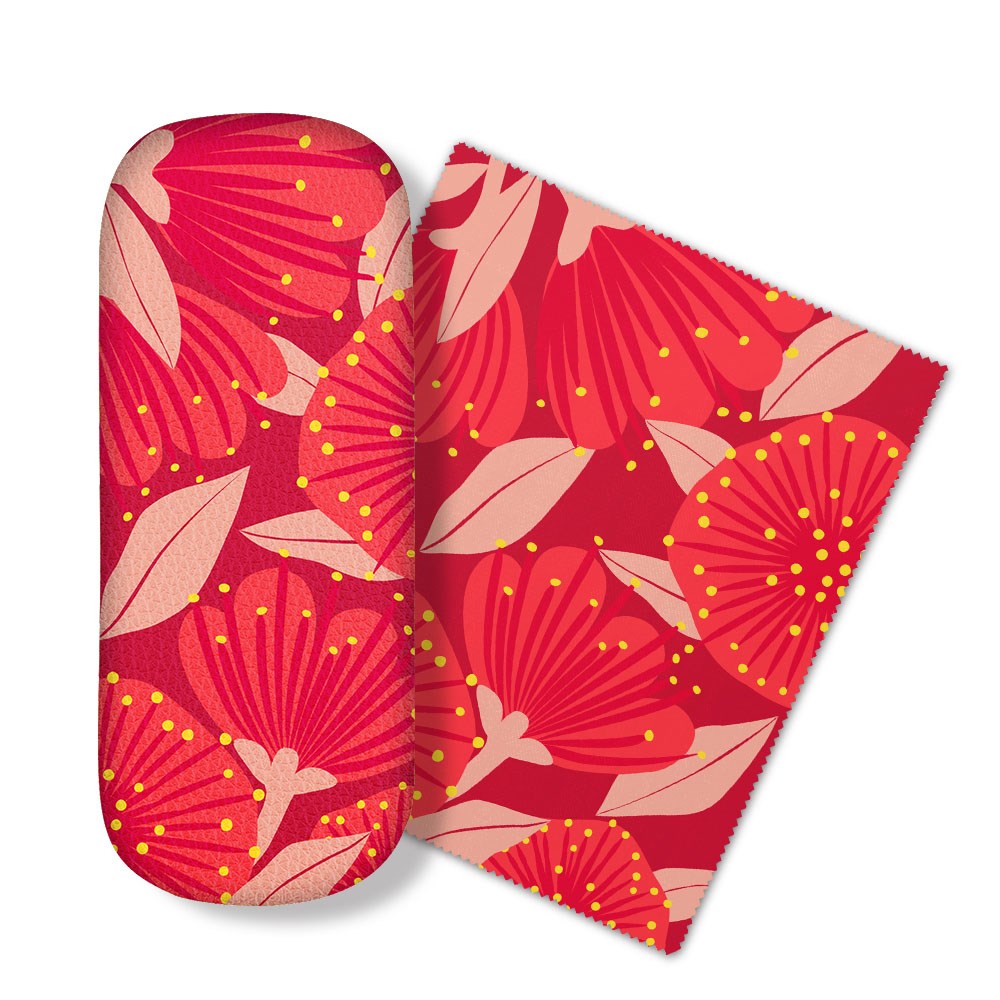The Bright Botanical Red Pohutukawa Glasses Case comes with a matching microfibre cloth, both featuring a bold red floral pattern—ideal for protecting your glasses and keeping them stylishly clean.