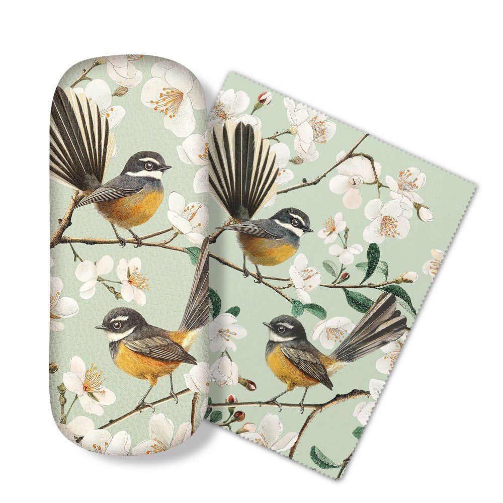 The Chatty Fantails Glasses Case comes with a matching microfibre cloth featuring small yellow and gray birds on branches with white flowers—ideal for cleaning your glasses or wiping electronics screens.