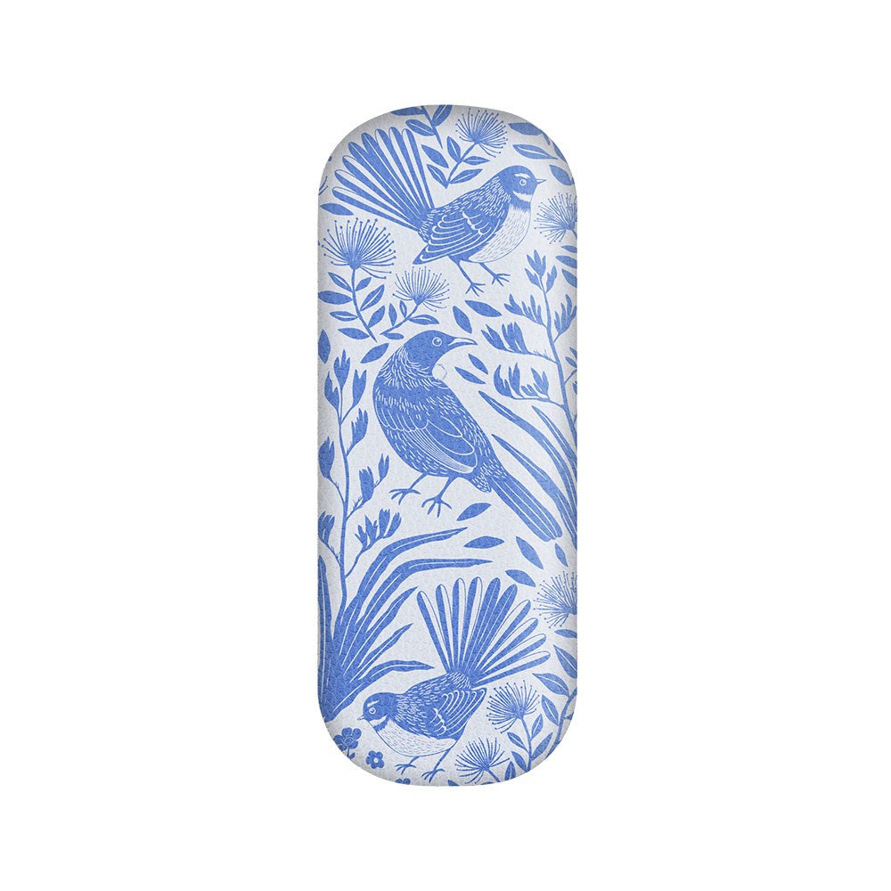 Introducing the Birdsong Blues Glasses Case: an oval-shaped hard shell case showcasing a simple and decorative blue and white illustration of three birds among leaves and flowers. This design not only adds charm, but also ensures sturdy protection to keep your eyewear safe on the go.
