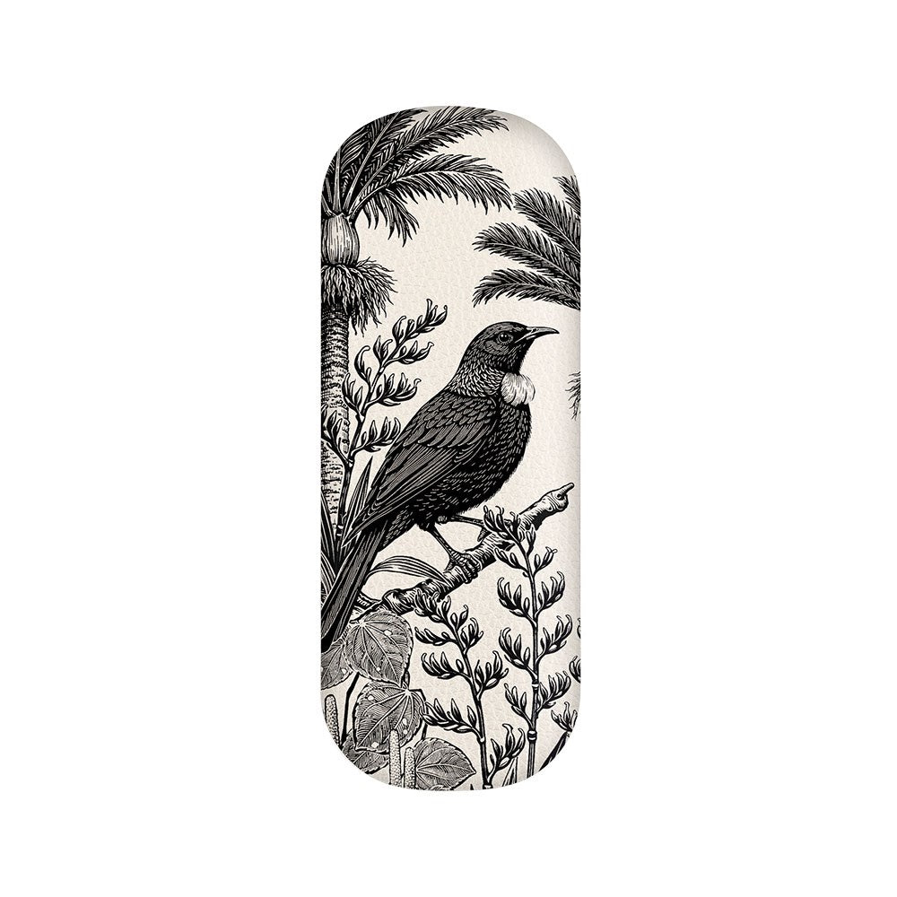 Black and white illustration of a bird with a white tuft on its neck, perched on a flowering branch amid intricate plants and palm leaves, set within an oval frame on a plain background—perfectly designed to adorn the Under the Nikau Glasses Case, a vegan leather hard shell case offering stylish protection for your eyewear.