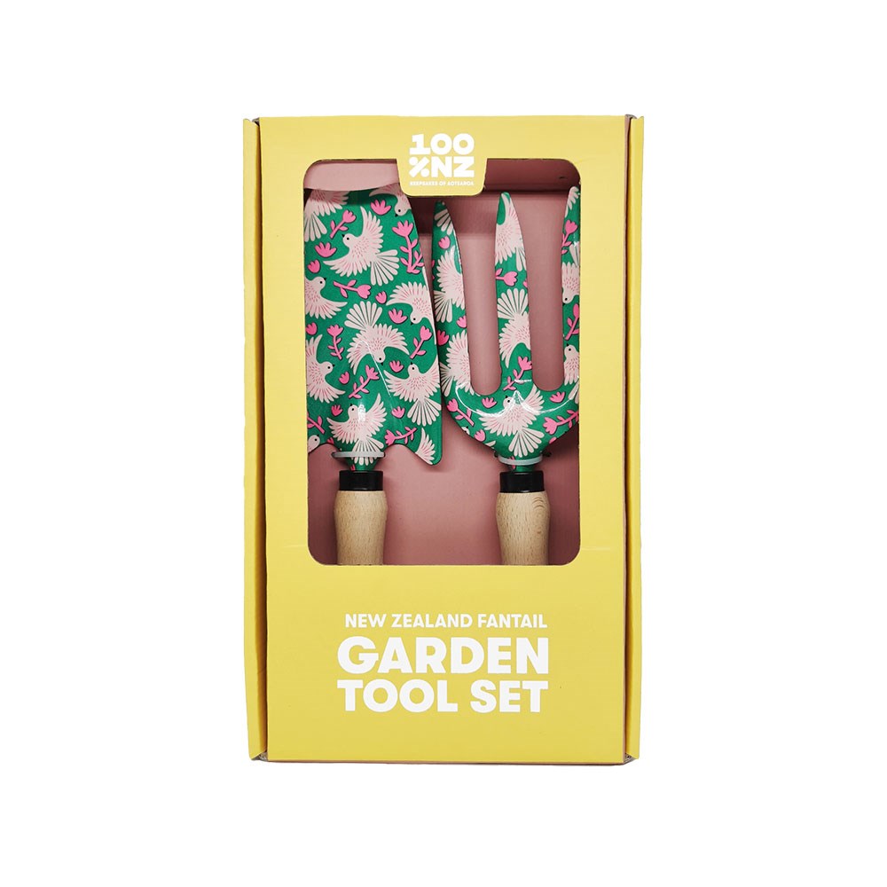 The Fantail Garden Tool Set includes a trowel and hand fork with durable ash wood handles and green, pink, and white metal parts featuring a charming New Zealand Fantails bird pattern, all boxed for easy gifting.