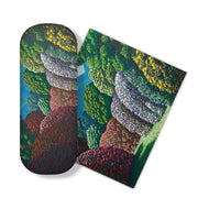 The Karl Maughan - Whenua Tapu Hills Glasses Case comes with a matching micro-fibre cloth, both featuring colorful, detailed illustrations of layered flower bushes in red, pink, purple, yellow, and green on a white background.