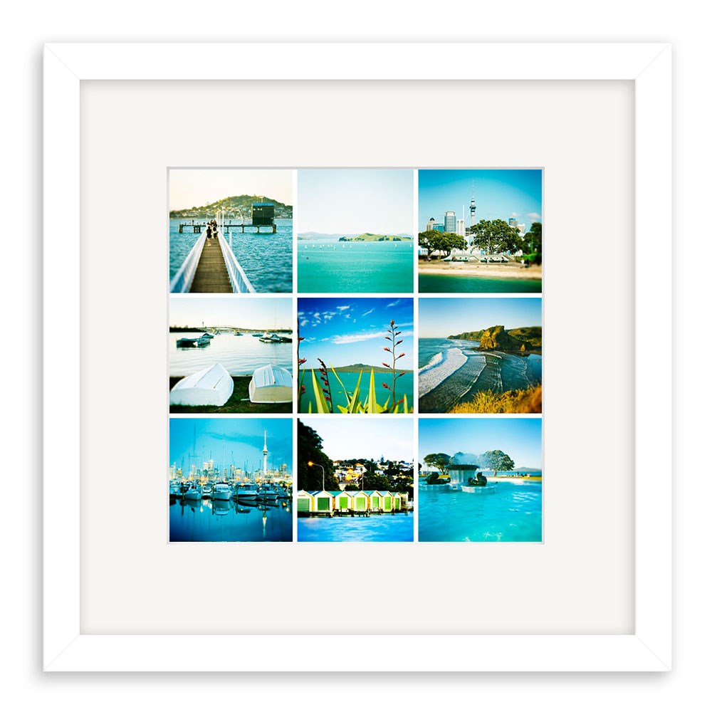 The Auckland Lomo Print is a white-framed collage with nine square photos of coastal scenes—boats, docks, beaches, and harbors—captured in vibrant Lomo style with bright blue skies.