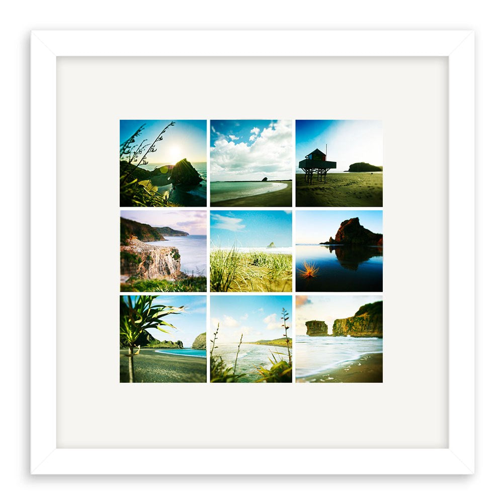 The West Coast Lomo Print features a white frame with a 3x3 grid of nine vibrant photos capturing New Zealands coastal beaches, cliffs, plants, and huts under clear or partly cloudy skies.