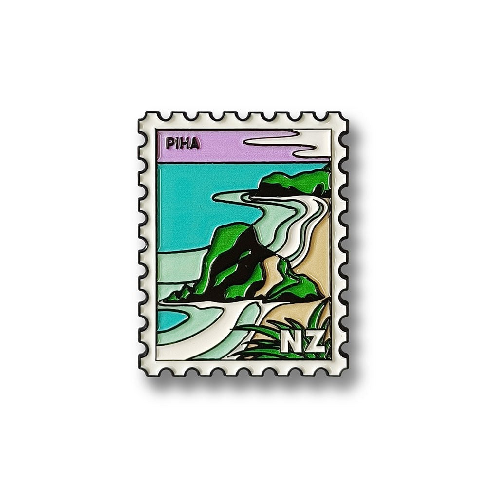 The Piha Collectible Stamp Magnet features Glenn Jones Artwork’s stylized illustration of Piha Beach, with rocky coastline, waves, sand, PIHA at the top, and NZ at the bottom right in a postage stamp design.