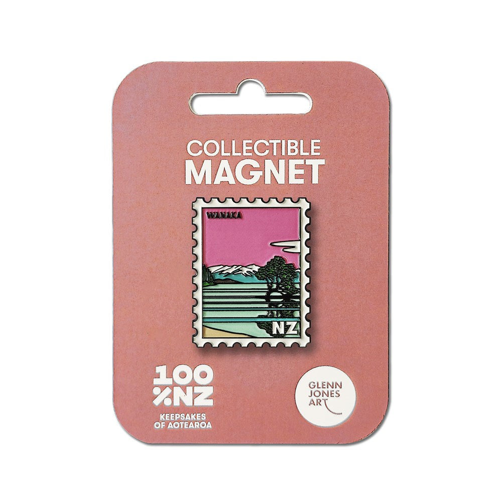 The Wanaka Collectible Stamp Magnet showcases Wanaka, NZ’s landscape. Designed in New Zealand by Glenn Jones, it comes on a pink “Collectible Magnet” card labeled 100% NZ Keepsakes of Aotearoa.