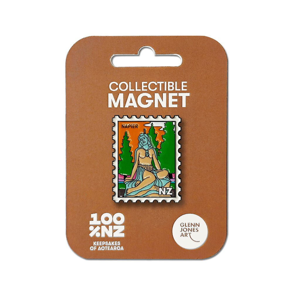 The Napier Collectible Stamp Magnet is a rectangular enamel magnet designed in the shape of a postage stamp, featuring vibrant artwork of a seated woman with green hair, trees, and the city name "Napier." It comes on a backing card that reads "Collectible Magnet" and "100% NZ Keepsakes of Aotearoa Glenn Jones Art," making it a perfect New Zealand collectible for your magnet collection.