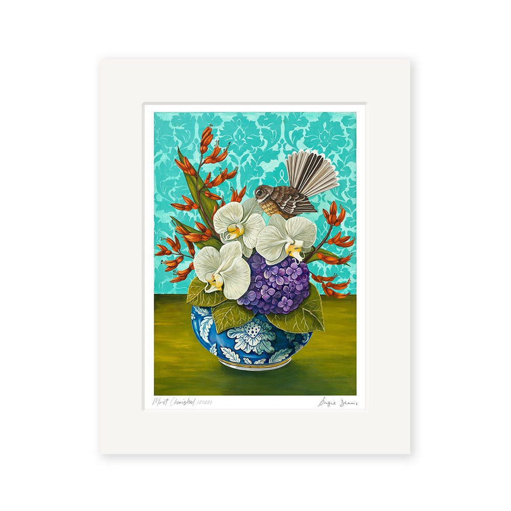 The Angie Dennis - Most Cherished Art Print shows white orchids, purple hydrangeas, and orange flowers in a blue vase with a brown bird, set against a turquoise floral background. Archival quality fine art by New Zealand artist Angie Dennis.