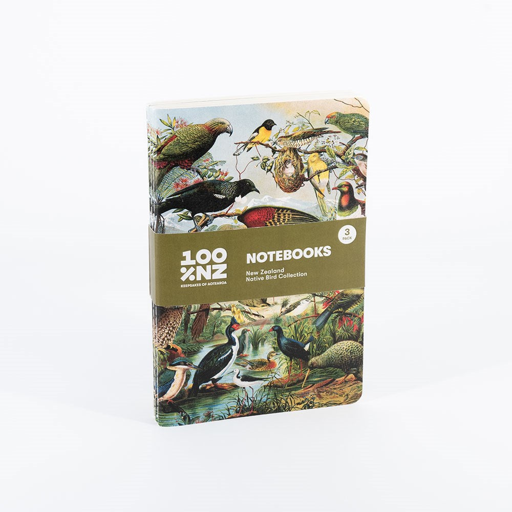 The NZ Native Birds Notebook Set features three notebooks per pack with colorful covers of native birds and plants, quality paper inside, and a brown band label—100% NZ made.