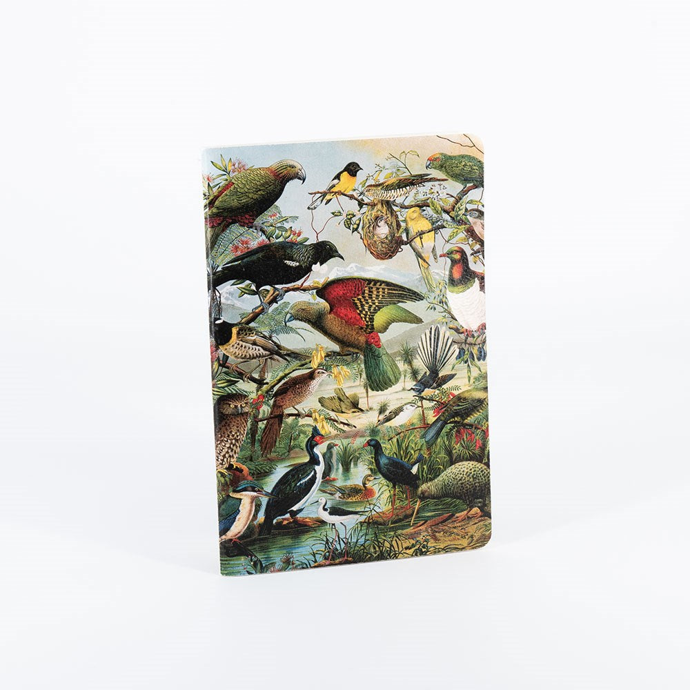 The NZ Native Birds Notebook Set features a colorful cover with illustrated birds on branches and near water, set against a white background. Crafted with quality paper, it offers an enjoyable writing experience.