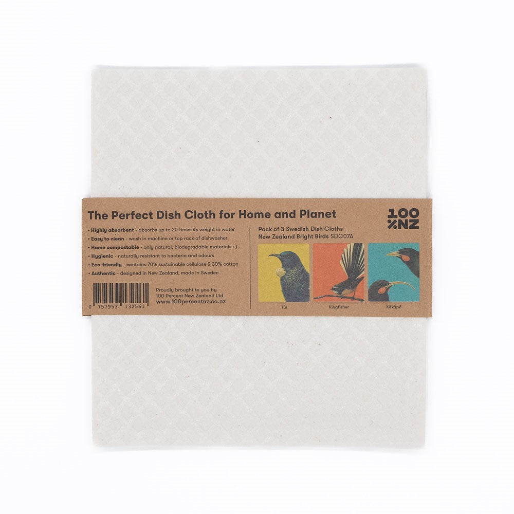 The Swedish Dishcloths - Bright Birds features a white diamond pattern, wrapped in kraft paper with product info, barcode, and Kiwiana bird illustrations (Tui, Kingfisher, Kākāpo). An eco-friendly cleaning choice.