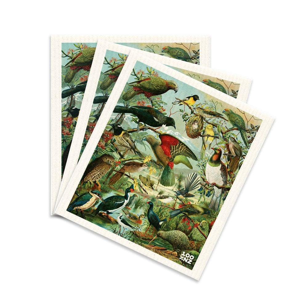 Three Swedish Dishcloths featuring collages of NZ native birds and animals in lush, plant-filled settings; charming Kiwiana imagery and a small Zoo NZ logo in the bottom right corner.
