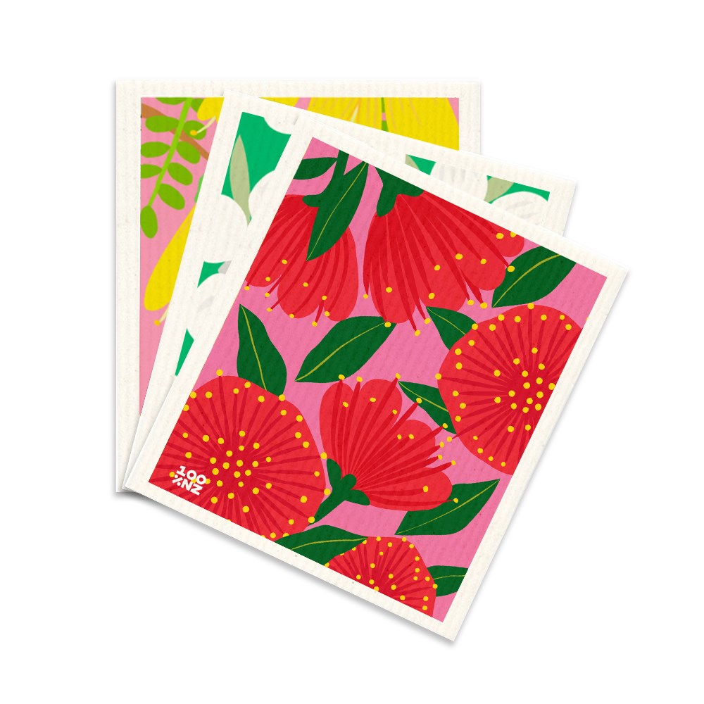 Three rectangular Swedish Dishcloths - Bright Botanicals with colorful floral designs—large red flowers, yellow dots, and green leaves on a pink background—overlapped and seen from above; an eco-friendly addition to your kitchen.
