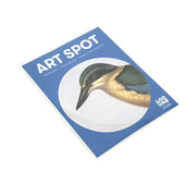 A blue “Hushed Blue Kingfisher Art Spot” card shows a bird’s head in a circle, with text: “Removable,” “Reusable,” and “Repositionable wall art.” The 100% NZ logo appears at the bottom right.
