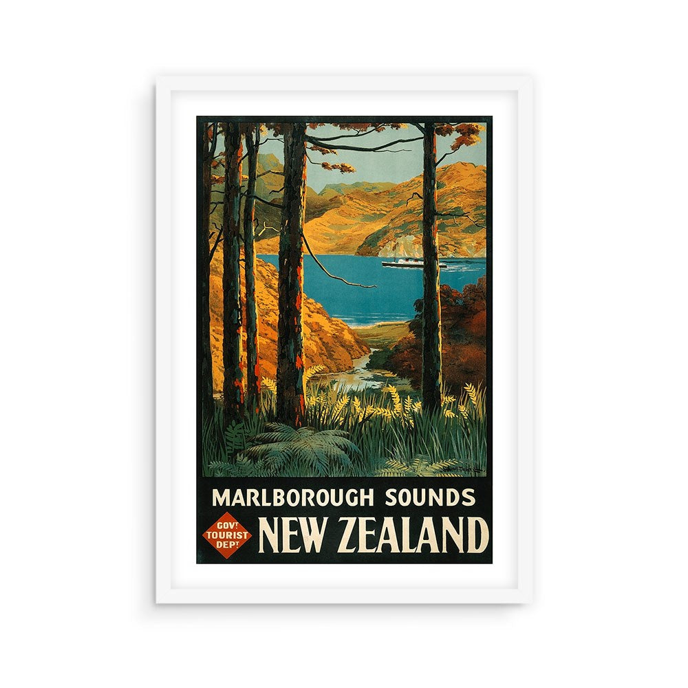 Marlborough Sounds Tourist Print: Framed archival vintage travel poster of New Zealand’s Marlborough Sounds, featuring lush trees, blue water, distant hills, and a sailing ship. Collectable text reads: Marlborough Sounds New Zealand.