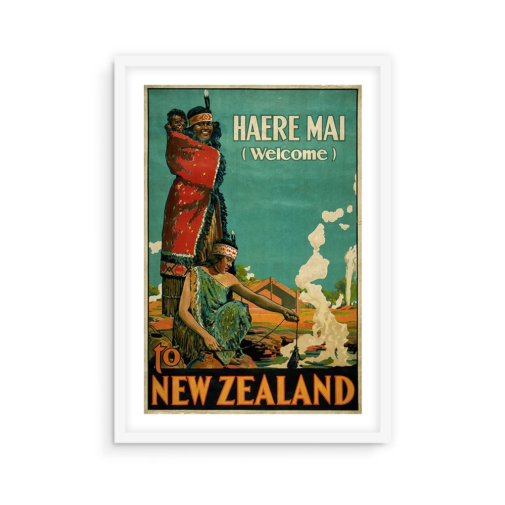 The Haere Mai Tourist Print showcases two people in traditional Māori clothing, one with a child and one by a fire, under the text “HAERE MAI (Welcome) TO NEW ZEALAND.” Beautifully framed in white, its ideal for collectors.