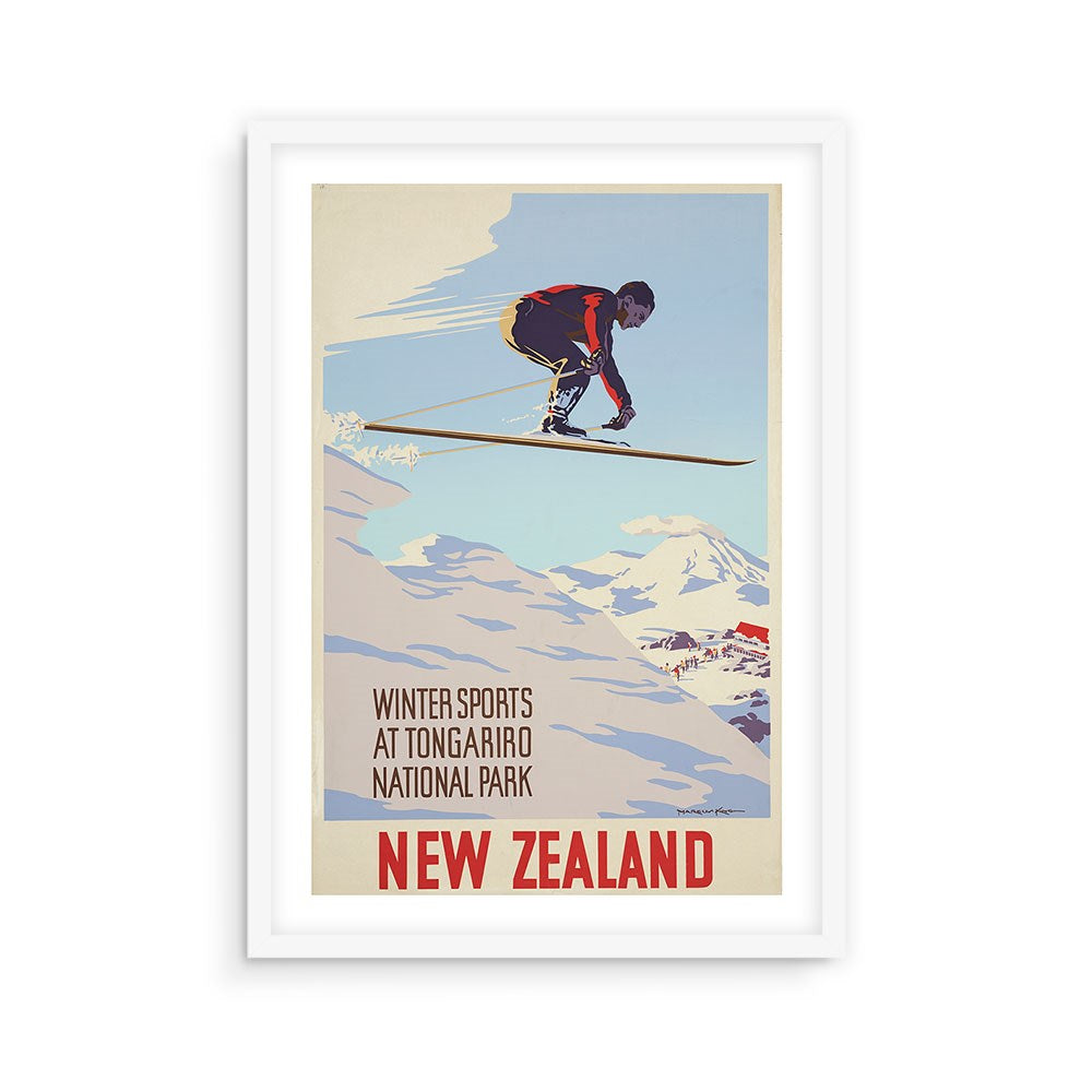 The Tongariro National Park Tourist Print features a vintage skier soaring before snowy mountains, with text: “Winter Sports at Tongariro National Park. New Zealand.” This archival print comes framed in white—a must-have for collectors.